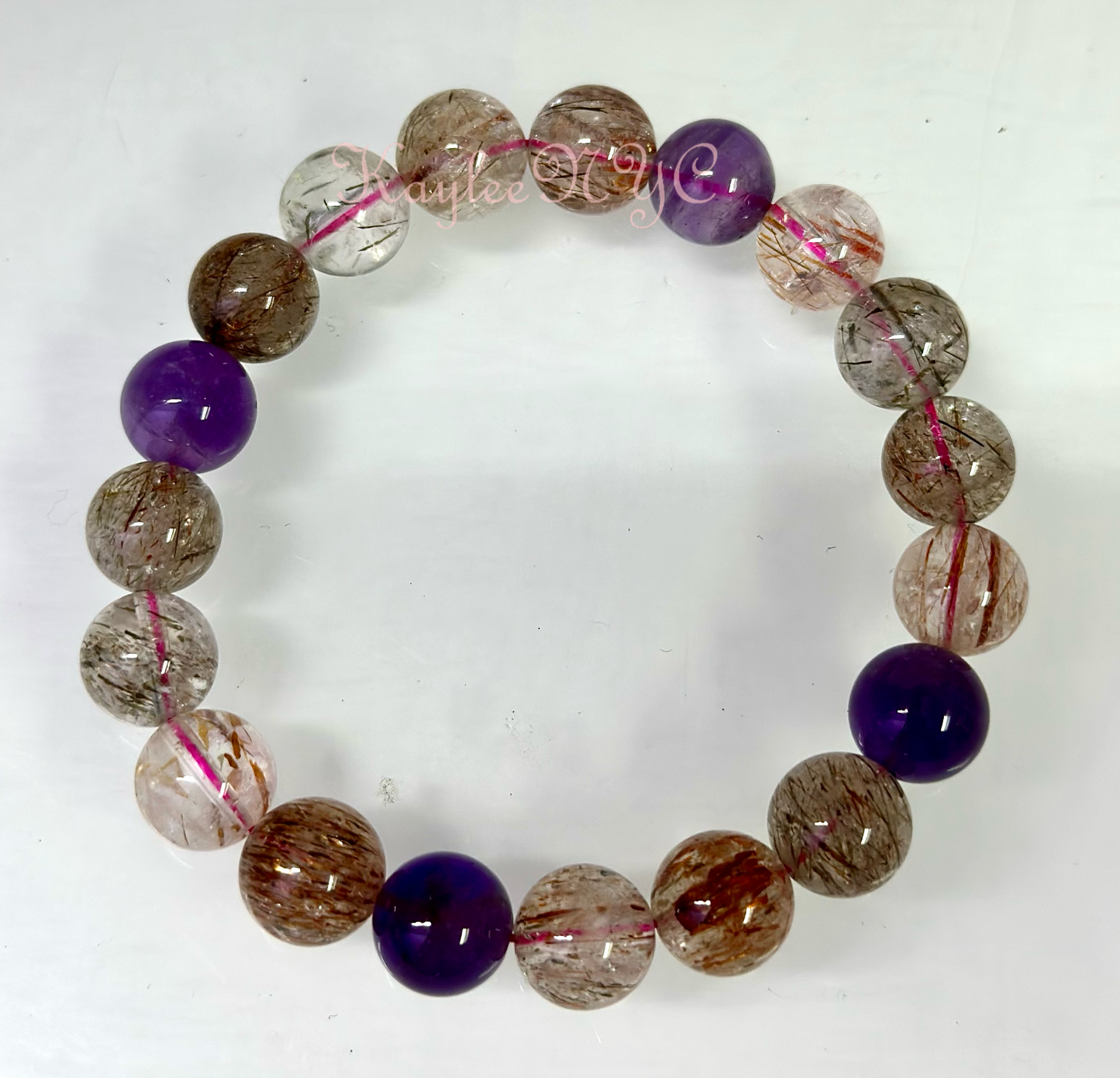 Natural Super 7 Melody Rutilated 10mm 8” Stretch Bracelet