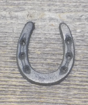 SMALL CAST IRON HORSESHOES , 2" LONG