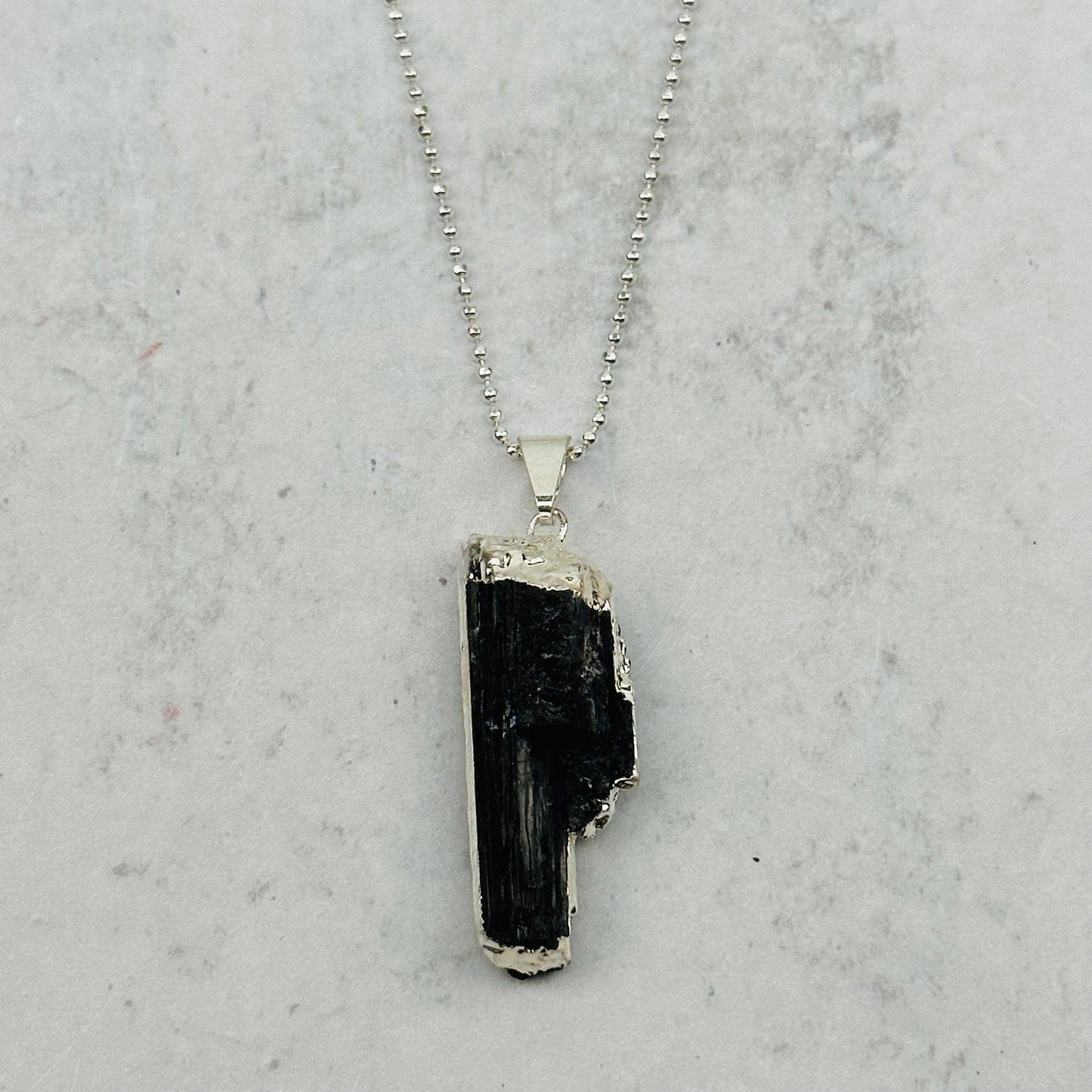 Black Tourmaline Crystal Pendant with Electroplated Silver E