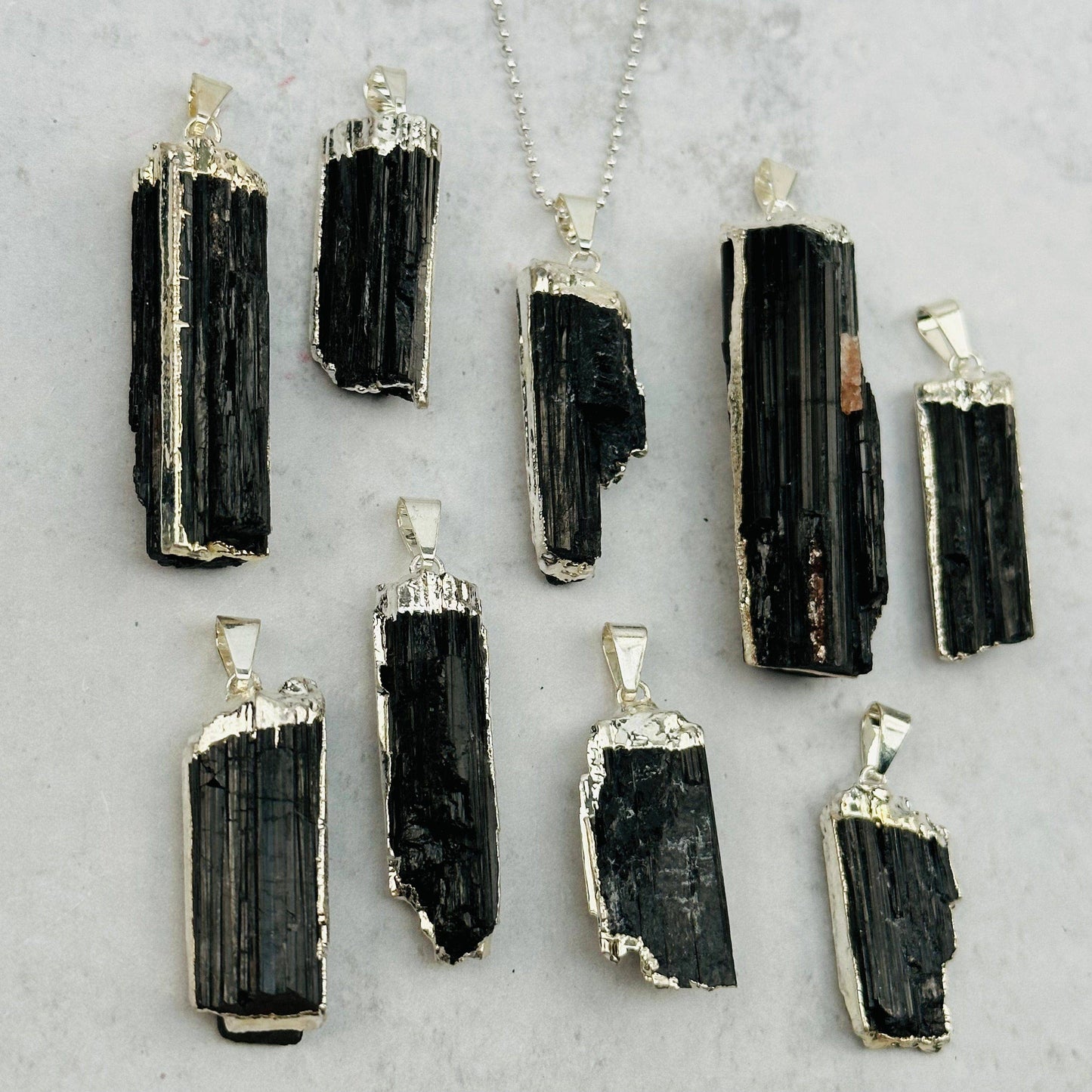 Black Tourmaline Crystal Pendant with Electroplated Silver E