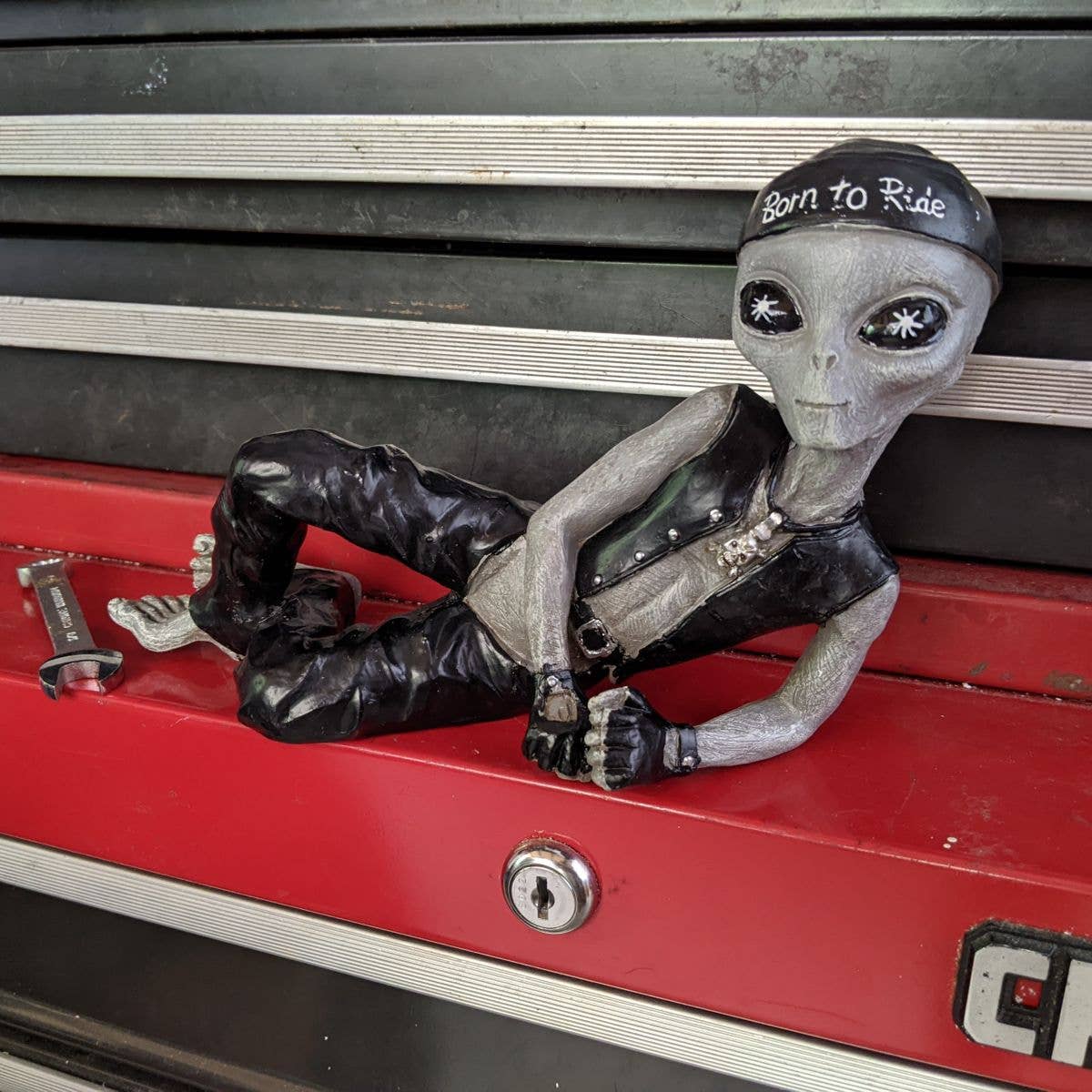 Alien Sexy Biker Dude Lying 10 inch Figurine: Gray