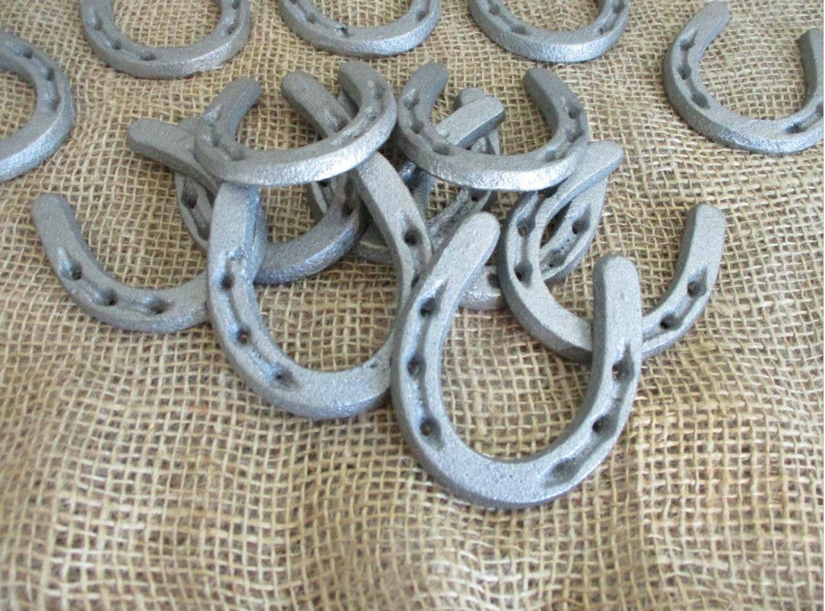 MEDIUM CAST IRON HORSESHOES 3 1/2" X 2 3/4"