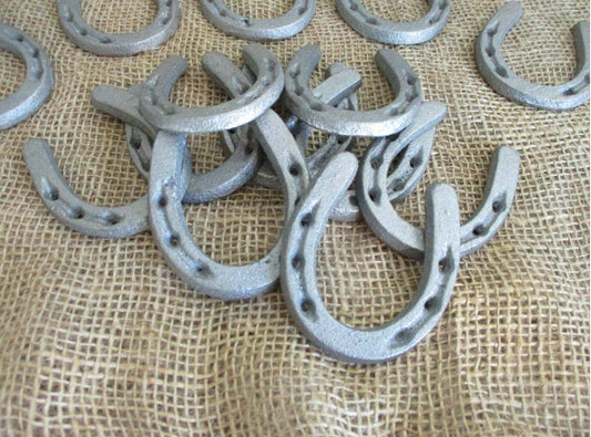 MEDIUM CAST IRON HORSESHOES 3 1/2" X 2 3/4"